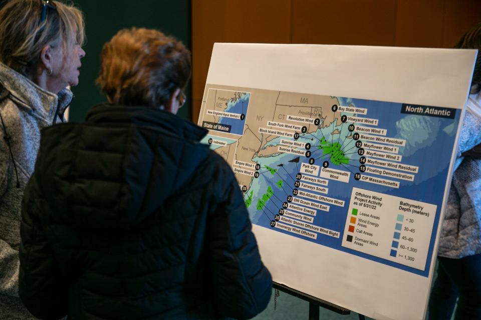 Attendees look over displays that show the scale of the wind farms proposed to be built in the North Atlantic region. NJ Congressmen Jeff Van Drew, Chris Smith and Maryland Rep. Andy Harris hold an offshore wind hearing at the Wildwood Convention Center. A panel of experts were brought in to discuss the rapid push to build wind farms and the numerous impacts the wind farms will have to the state.