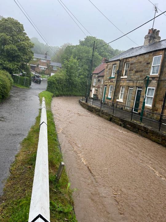 A flooded street in Loftus 