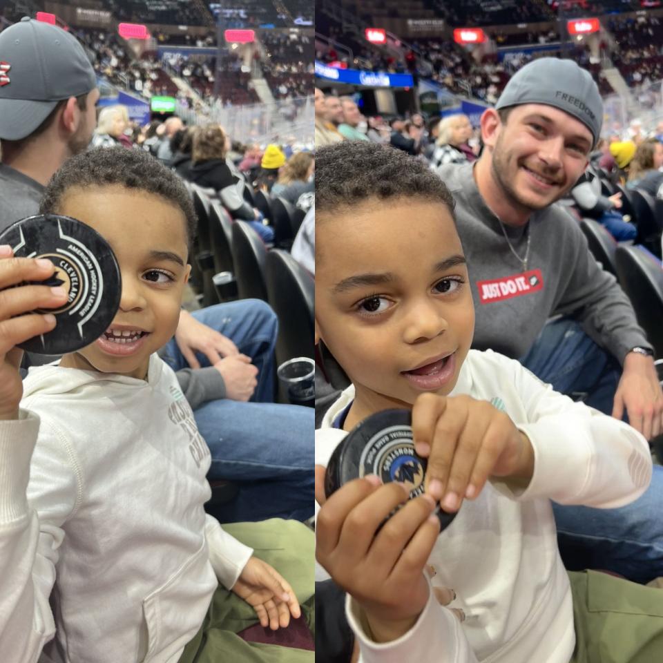 Andrew Podolak with 4-year-old Nasir at a Cleveland Monsters game on Thursday, April 11, 2024.