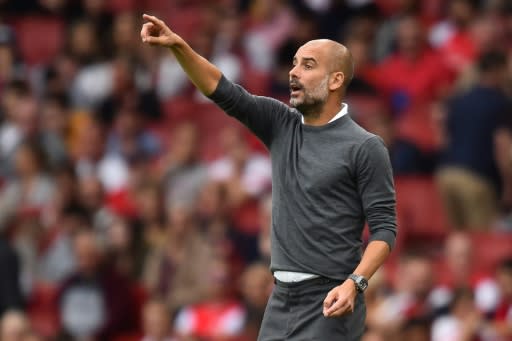 Manchester City manager Pep Guardiola gestures on the touchline