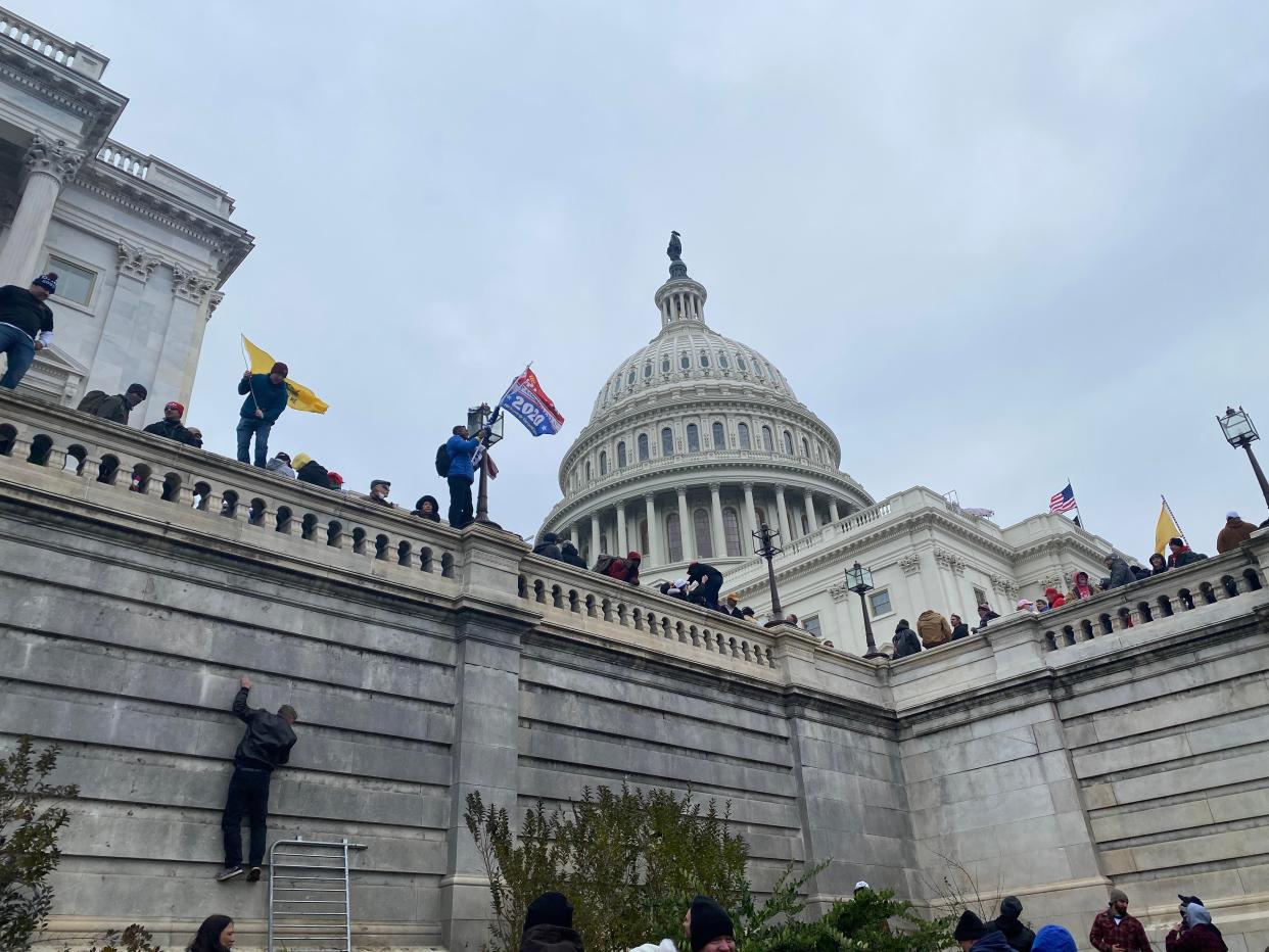 <p>As protesters rampaged through the Capitol, Twitter users recall the heavy handedness during BLM </p> (Richard Hall / The Independent )