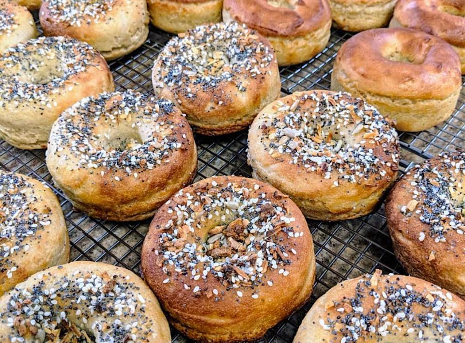 Gluten-free bagels coming out of the oven at Starseed Bakery.