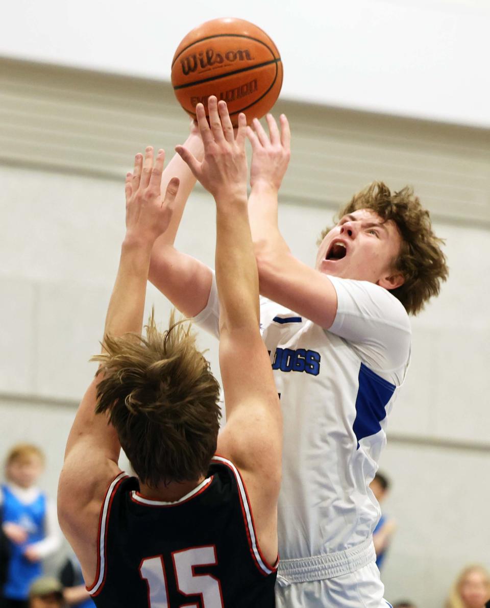 Holbrook's Owen Burke was fouled by Mount Greylock's Seamus Barnes during a game on Friday, March 10, 2023.