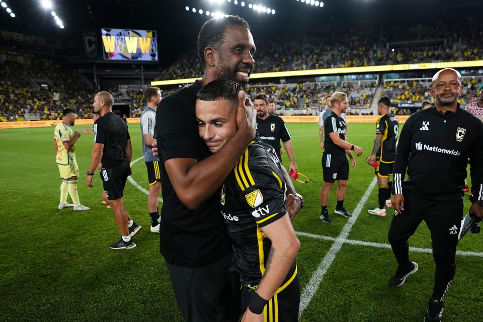 Preferred CP: Crew coach Wilfried Nancy hugs midfielder Alexandru Matan following a 2-1 win over the New York Red Bulls in July.