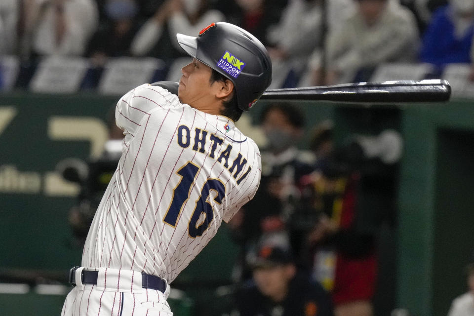 Shohei Ohtani of Japan bats during their Pool B game against the Czech Republic at the World Baseball Classic at the Tokyo Dome, Japan, Saturday, March 11, 2023. (AP Photo/Eugene Hoshiko)