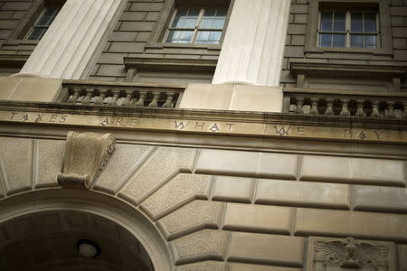 A general view of the U.S. Internal Revenue Service (IRS) building, with the partial quote "taxes are what we pay," in Washington May 27, 2015. REUTERS/Jonathan Ernst