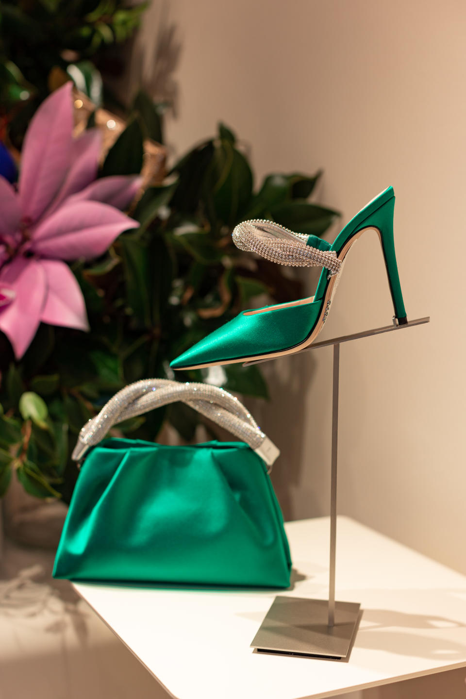 Rodo’s Berenice bag and an embellished mule, both in satin and crystals, for fall winter ’23. - Credit: Courtesy of brand