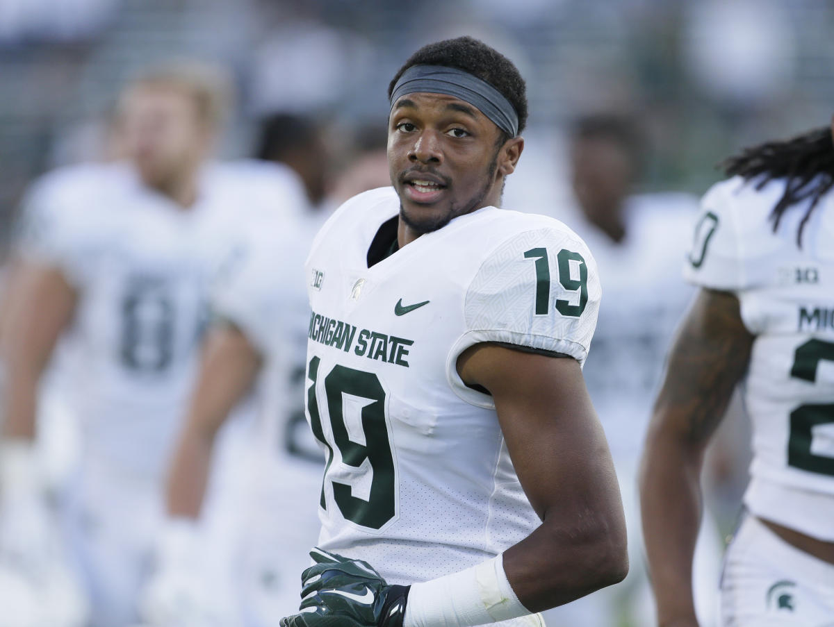 Michigan State football player Josh Butler takes to field with dogs for  Senior Night after losing both parents - ABC7 New York