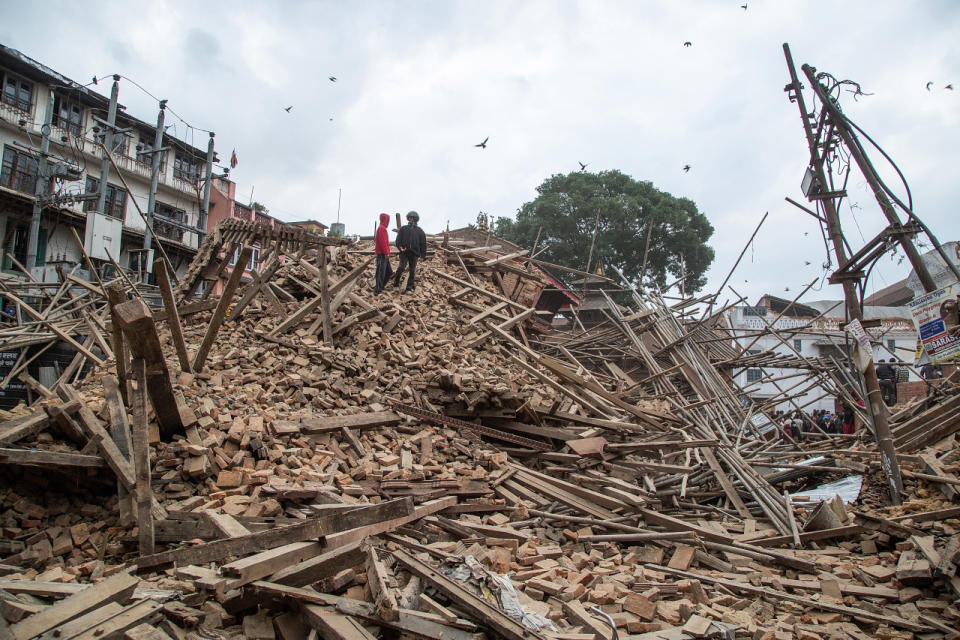 Strong earthquake and aftershocks shake Nepal A powerful earthquake struck Nepal Saturday, killing at least 1,180 people across a swath of four countries as the violently shaking earth collapsed houses, leveled centuries-old temples and triggered avalanches on Mt. Everest. It was the worst tremor to hit the poor South Asian nation in over 80 years. At least 1,130 people were confirmed dead across Nepal, according to the police. Another 34 were killed in India, 12 in Tibet and two in Bangladesh. Two Chinese citizens died in the Nepal-China border. The death toll is almost certain to rise, said deputy Inspector General of Police Komal Singh Bam. (AP) Photography by Omar Havana/Getty Images See more earthquake photos and our other slideshows on Yahoo News.