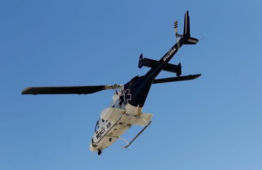 Dan Wheldon of England is flown to the hospital in an air ambulance after being involved in a 15 car wreck during the Las Vegas Indy 300. Wheldon was seriously hurt in a massive 15-car crash that sent his and several other cars airborne early in the Las Vegas 300 IndyCar series finale on Sunday