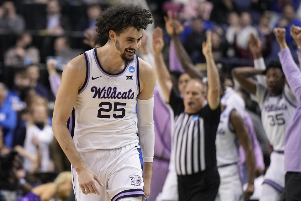 Kansas State forward Ismael Massoud celebrates after scoring against Kentucky during the second half of a second-round college basketball game in the NCAA Tournament on Sunday, March 19, 2023, in Greensboro, N.C. (AP Photo/Chris Carlson)