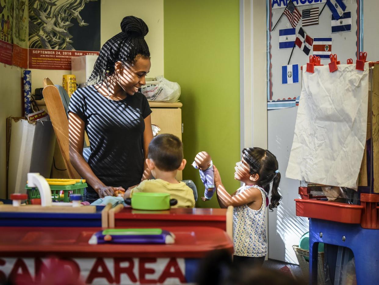 <span class="caption">The majority of child care workers are women and people of color. </span> <span class="attribution"><a class="link " href="https://www.gettyimages.com/detail/news-photo/tyonna-stinnie-left-working-toward-her-certification-at-sed-news-photo/826835506?adppopup=true" rel="nofollow noopener" target="_blank" data-ylk="slk:Bill O'Leary/The Washington Post via Getty Images;elm:context_link;itc:0;sec:content-canvas"> Bill O'Leary/The Washington Post via Getty Images</a></span>