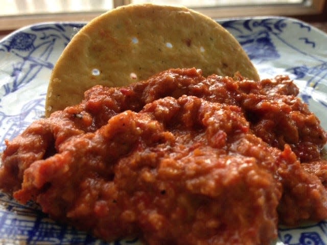 Roasted red pepper puree swirled into baba ganoush