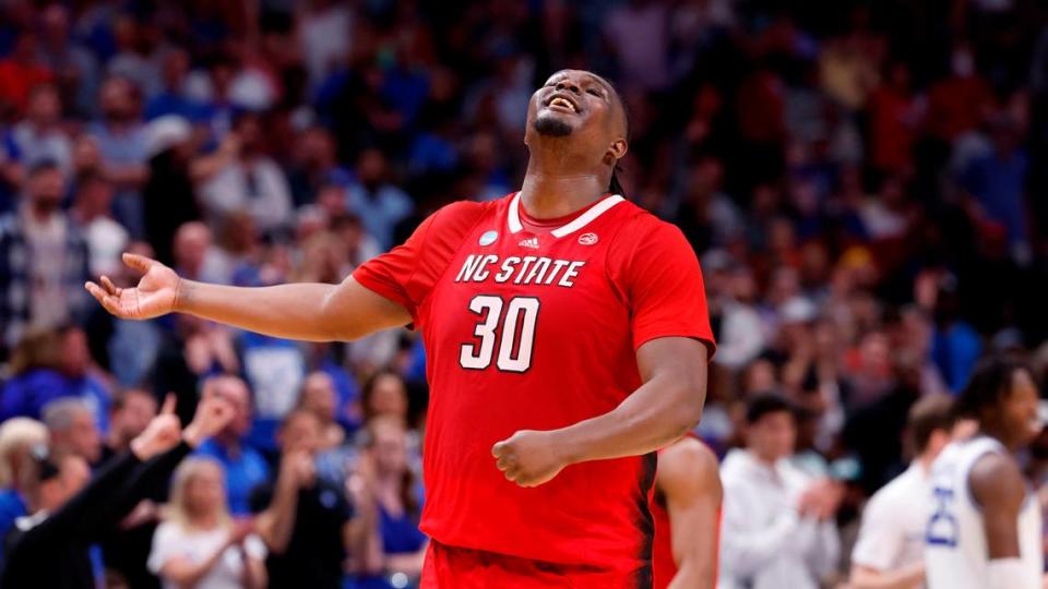 NC State’s DJ Burns dances during a timeout late in the Wolfpack’s game against Duke in the NCAA Tournament Elite 8.