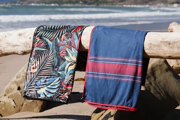 A towel designed to be fast-drying, lightweight, and sand-repelling