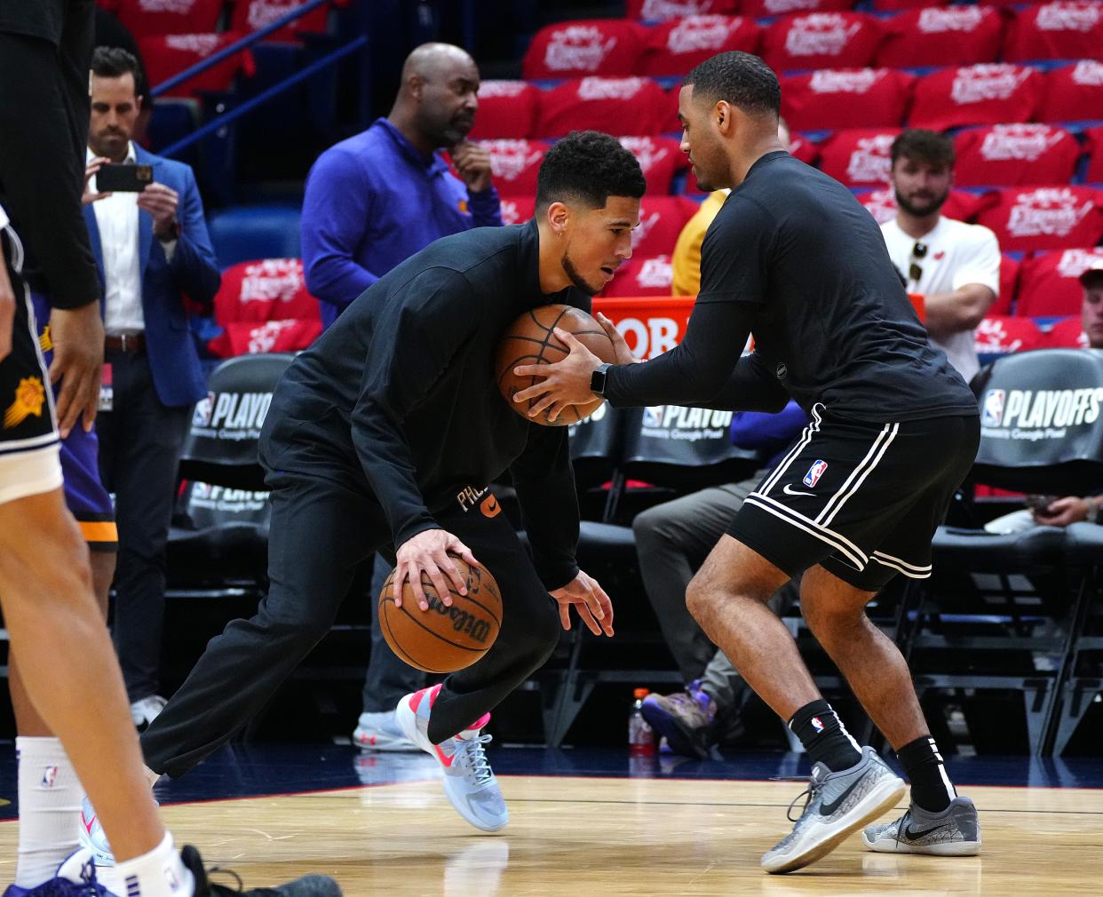 Suns' Devin Booker warms up prior to Game 6 of the first round of the Western Conference Playoffs.