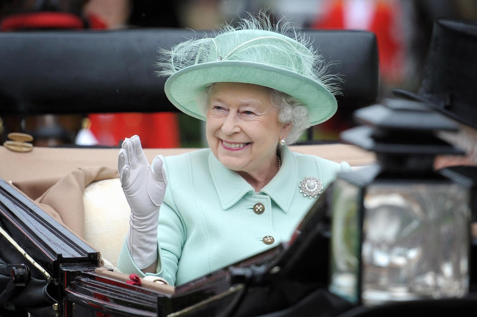 <p>The Queen arrives during day three of the 2012 Royal Ascot meeting at Ascot Racecourse, Berkshire. (PA)</p> 