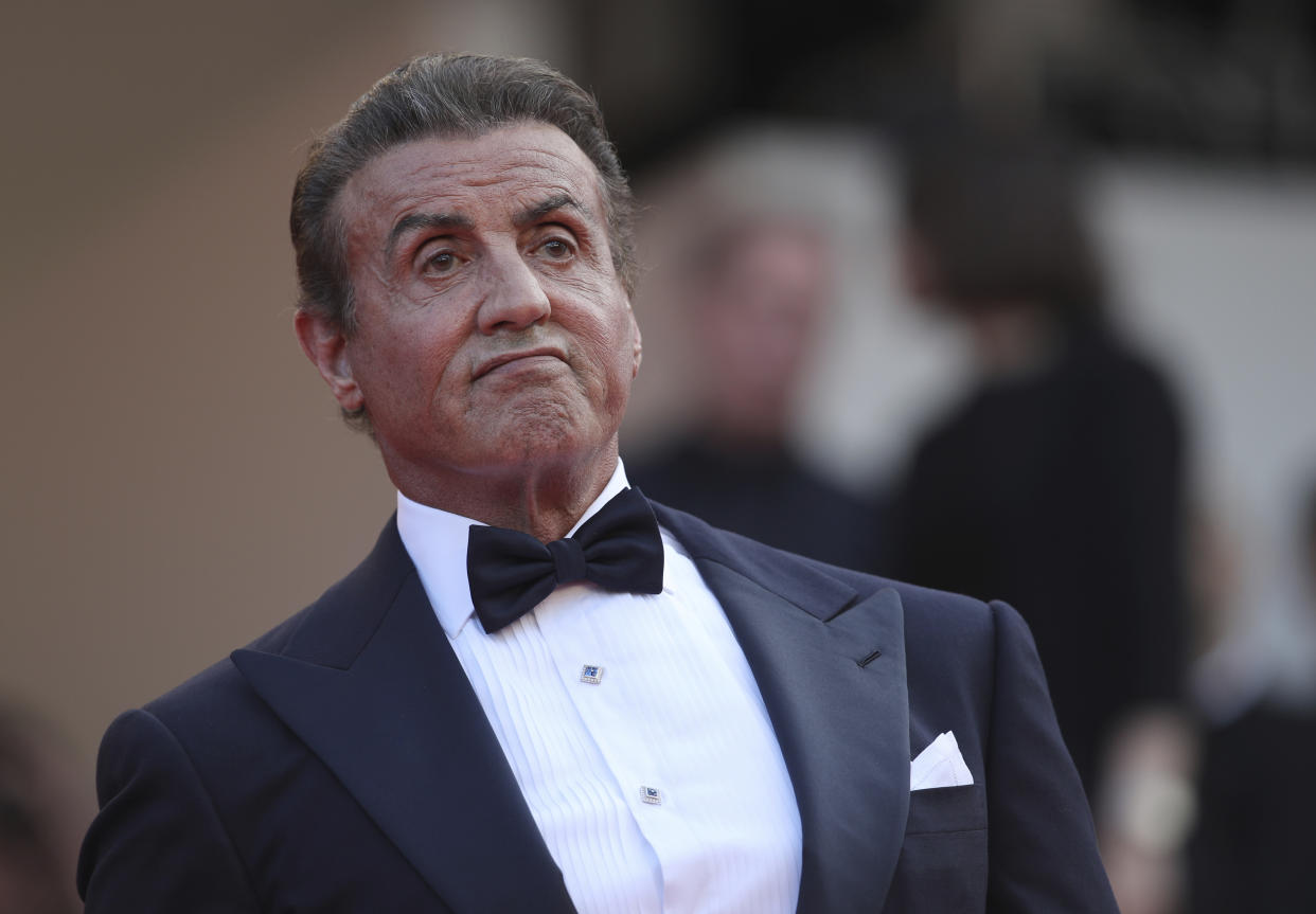 Actor Sylvester Stallone poses for photographers upon arrival at the awards ceremony of the 72nd international film festival, Cannes, southern France, Saturday, May 25, 2019. (AP Photo/Petros Giannakouris)