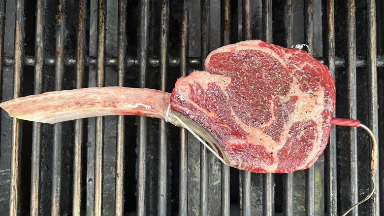 tomahawk steak on grill