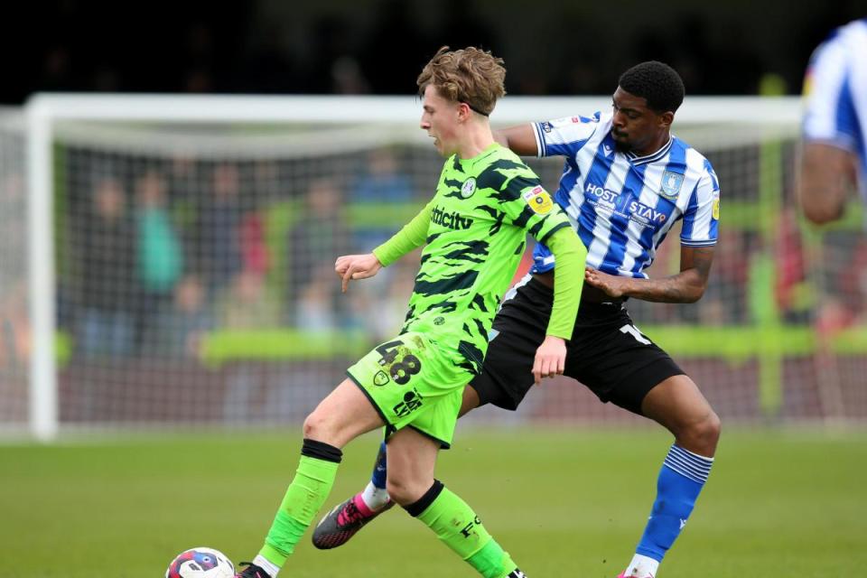 Tyreeq Bakinson (right) has joined Wycombe Wanderers from Sheffield Wednesday <i>(Image: PA)</i>