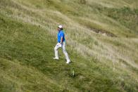 Team Europe's Tommy Fleetwood looks at his shot on the fourth hole during a four-ball match the Ryder Cup at the Whistling Straits Golf Course Friday, Sept. 24, 2021, in Sheboygan, Wis. (AP Photo/Charlie Neibergall)