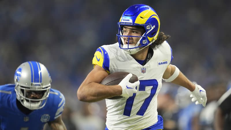 Los Angeles Rams receiver Puka Nacua runs toward the end zone for a touchdown during an NFL wild-card playoff football game against the Detroit Lions, Sunday, Jan. 14, 2024, in Detroit. 