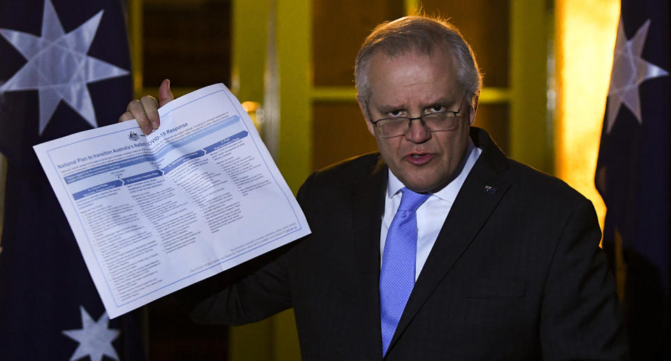 Australian Prime Minister Scott Morrison speaks to the media during a press conference following a national cabinet meeting, at the Lodge in Canberra, Friday, July 30, 2021