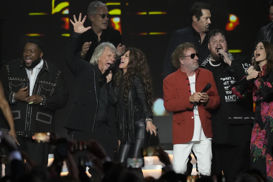 Michael Trotter Jr., Hugh McDonald, Jon Bon Jovi, Shania Twain, John Shanks, Jelly Roll, and Rebecca Lovell perform during MusiCares Person of the Year honoring Jon Bon Jovi on Friday, Feb. 2, 2024, in Los Angeles. (AP Photo/Chris Pizzello)