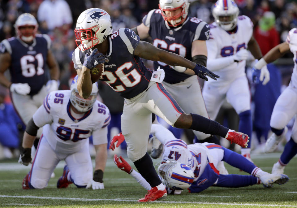 Sony Michel and the New England Patriots clinched the AFC East title on Sunday, the 10th straight division title for the Patriots. (AP)