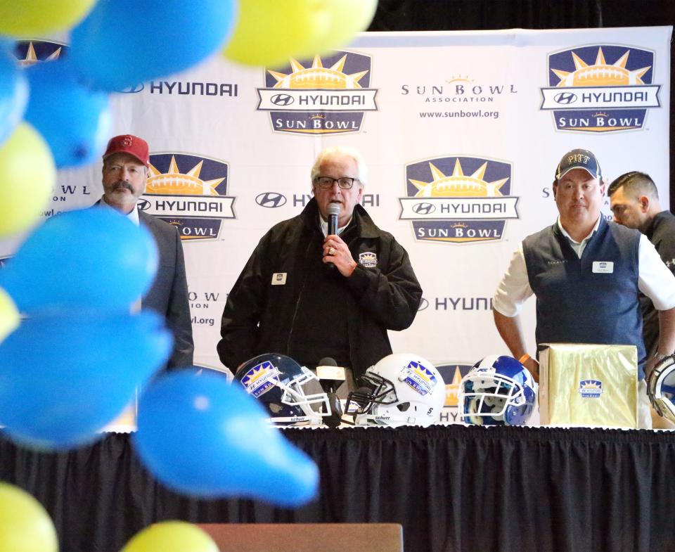 John Folmer, center, will be one of the grand marshals for the Thanksgiving parade. He is shown announcing the 85th Hyundai Sun Bowl game teams in 2018.