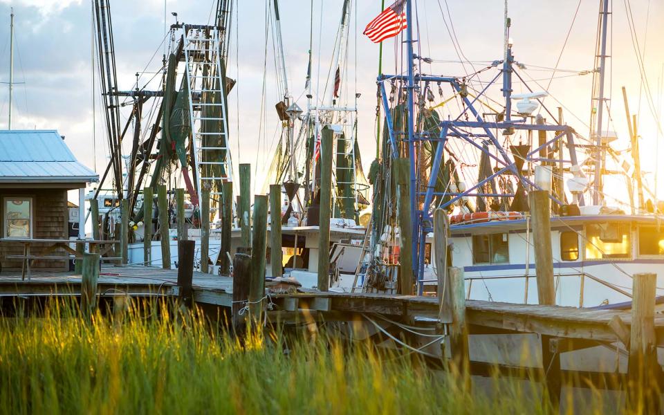 <p>The deck of the historic World War II aircraft carrier U.S.S. Yorktown in Charleston Harbor is the site of the 9 p.m. fireworks display at Patriots Point. You can buy a ticket to board the ship or watch the show on land.</p> <p>On July 3, <i>S</i>tars and Guitars presents a country music show at Boone Hall Plantation in Mt. Pleasant. The show’s opening acts start at 6 p.m., and country star Trace Adkins performs at 8 p.m. The Fourth of July Fireworks Bash at Patriots Point starts at 4 p.m. with food, drink, music, and family-friendly activities. The Uncle Sam Jam on Mt. Pleasant Pier starts at 7 p.m. leading up to the fireworks with food, drink, and dancing to beach music.</p> <p>At Riverfront Park from 3-9:45 p.m., enjoy live music, food trucks, craft beer, and what’s billed as “low country’s largest Fourth of July fireworks show.” In keeping with the theme, the South Carolina Aquarium in Charleston features Sea Stars and Stripes from 7-10 p.m., featuring a dinner of barbecue and low country boil.</p>