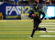 EUGENE, OR - DECEMBER 02 : Running back LaMichael James #21 of the Oregon Ducks breaks into the open in the first quarter of the Pac-12 Championship game against the UCLA Bruins at Autzen Stadium on December 2, 2011 in Eugene, Oregon. (Photo by Steve Dykes/Getty Images)