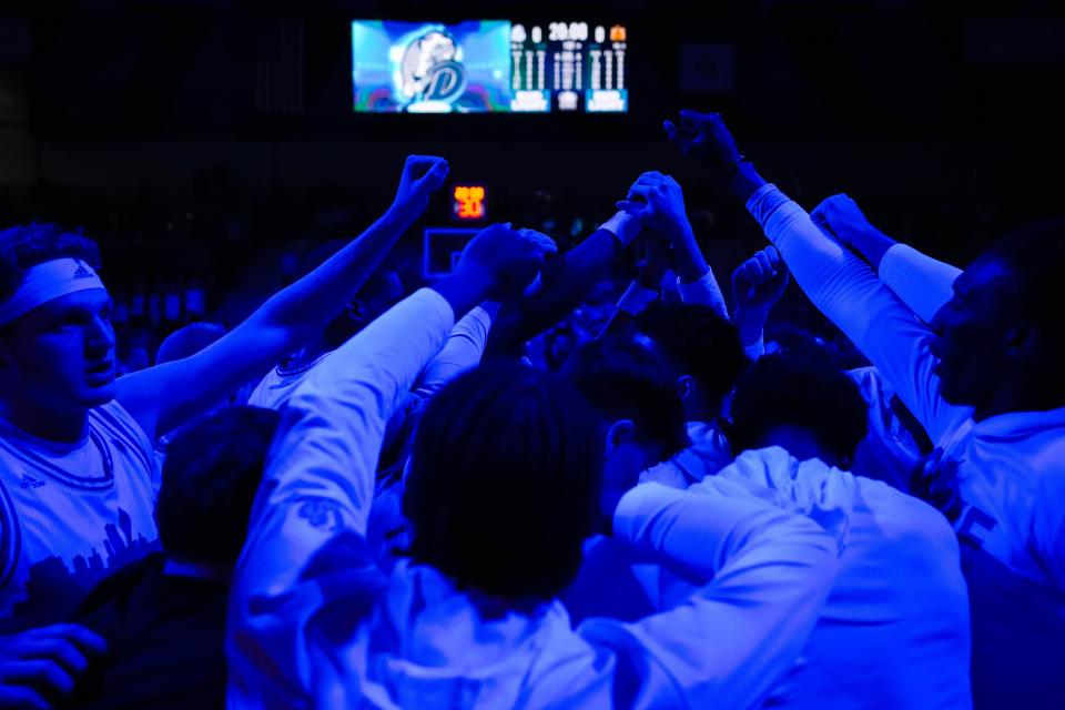 Drake’s men basketball team huddles before the Des Moines' Hometown team weekend at Knapp Center on Saturday, Jan. 7, 2023. The Bulldogs beat the Racers, 82-64.