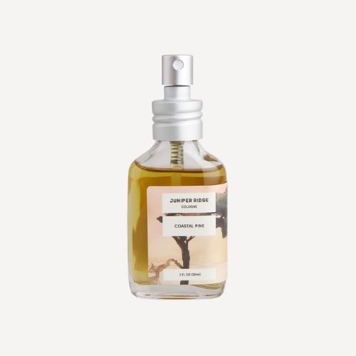 bottle of Juniper Ridge Coastal Pine cologne against white background