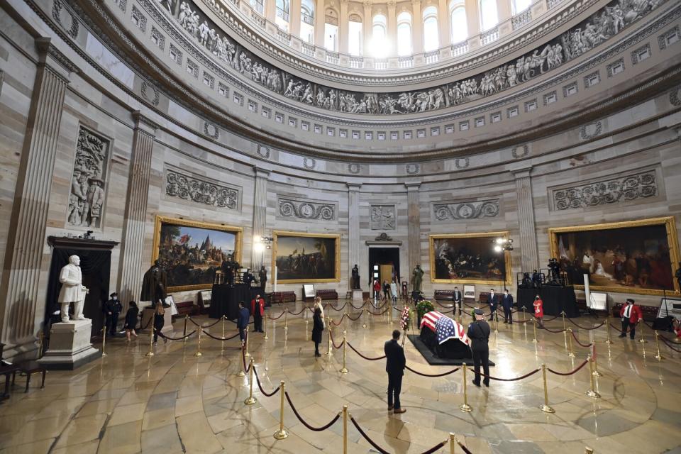 People pay their respects to former Sen. Bob Dole of Kansas.