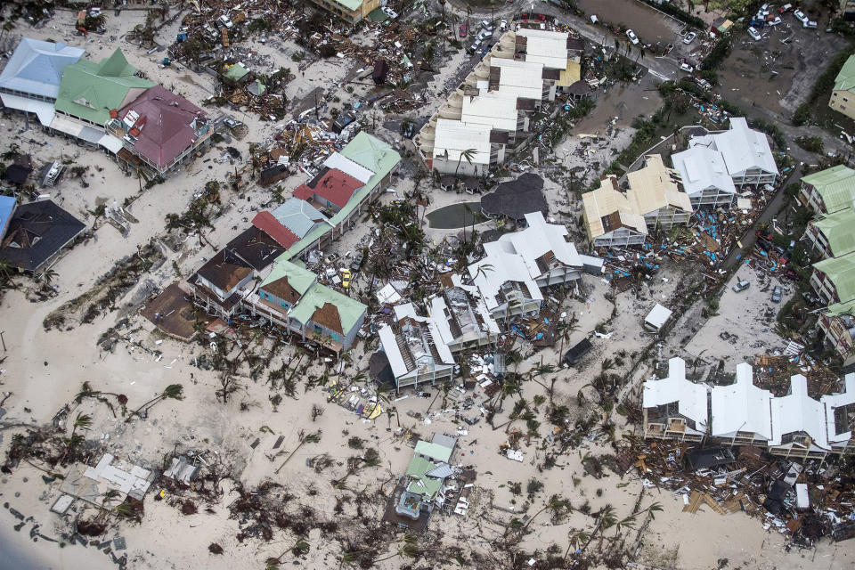 <p>SEPT. 6, 2017 – An aerial photo shows the damage of Hurricane Irma in Orient Bay, on the French side of the Caribbean island of Saint Martin.<br> Hurricane Irma sowed a trail of deadly devastation through the Caribbean reducing to rubble the tropical islands of Barbuda and St Martin. (Photo: Gerben Van Es /AFP/Getty Images) </p>