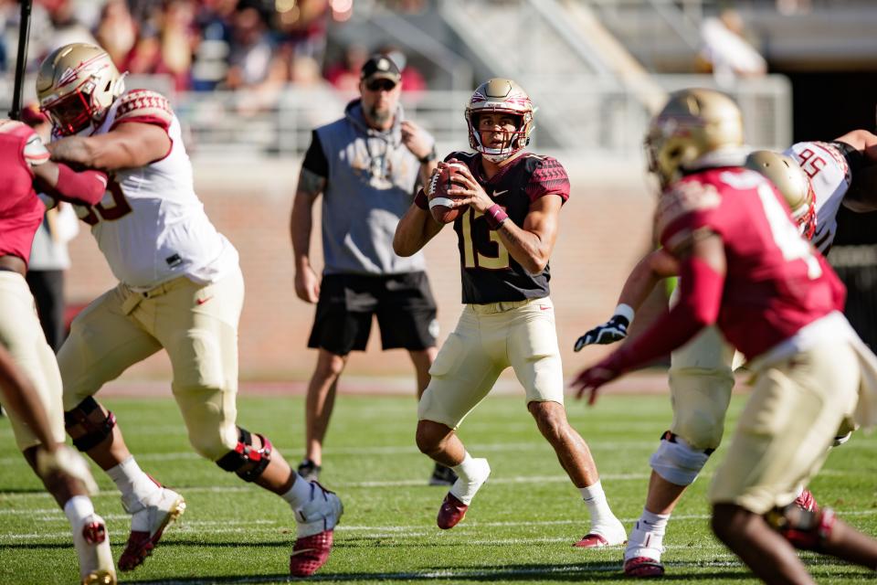 Florida State Seminoles quarterback Jordan Travis (13) looks down the field for an open teammate. The Florida State Seminoles hosted their annual Garnet and Gold spring game at Doak Campbell Stadium on Saturday, April 9, 2022.
