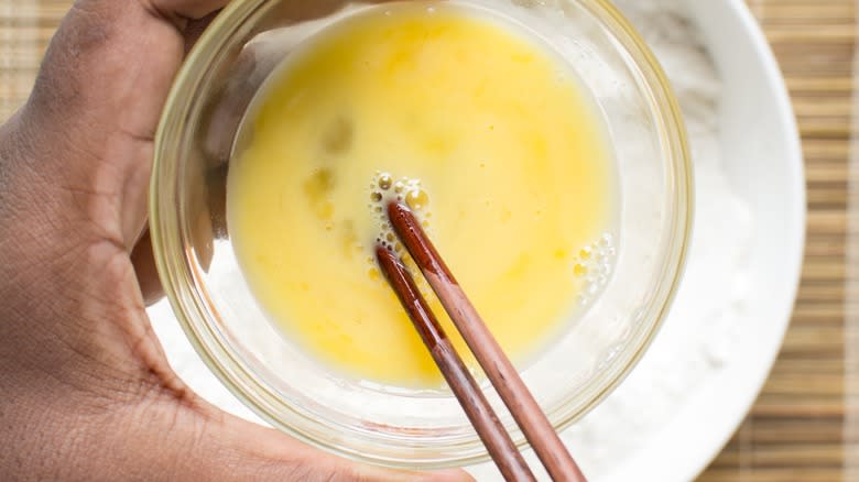 scrambling eggs with chopsticks