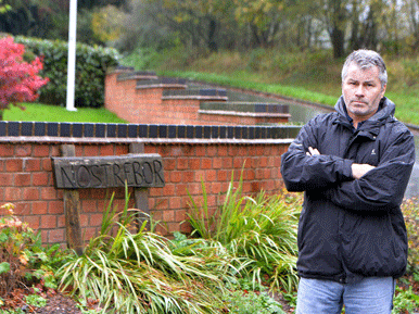 Garry Painter forced to knock down a wall in his own garden by council