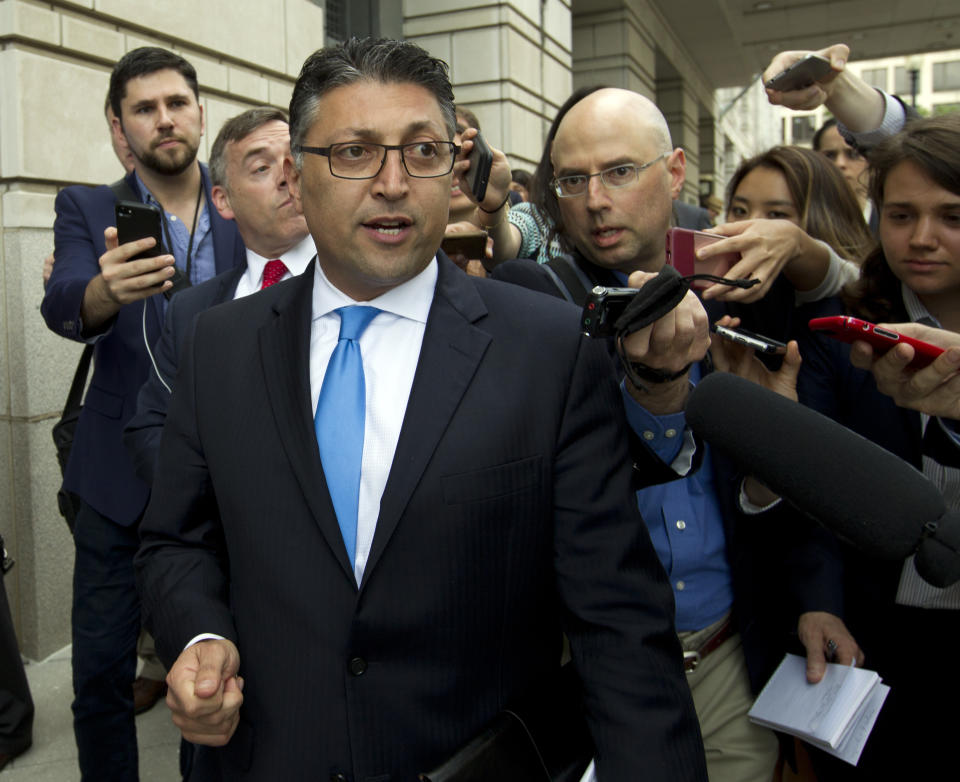 Assistant Attorney General for Antitrust Makan Delrahim leaves the federal courthouse Tuesday, June 12, 2018, in Washington. . (AP Photo/Jose Luis Magana)