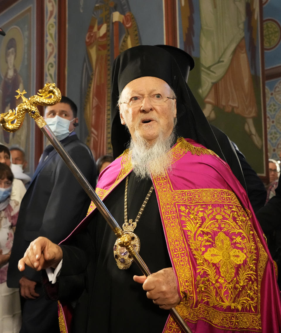 Ecumenical Patriarch Bartholomew I, blesses parishioners in the Mikhailovsky Zlatoverkhy Cathedral (St. Michael's Golden-Domed Cathedral) in Kyiv, Ukraine, Saturday, Aug. 21, 2021. Bartholomew I, arrived to Kyiv to mark the 30th anniversary of Ukraine's independence that is celebrated on Aug. 24. (AP Photo/Efrem Lukatsky)