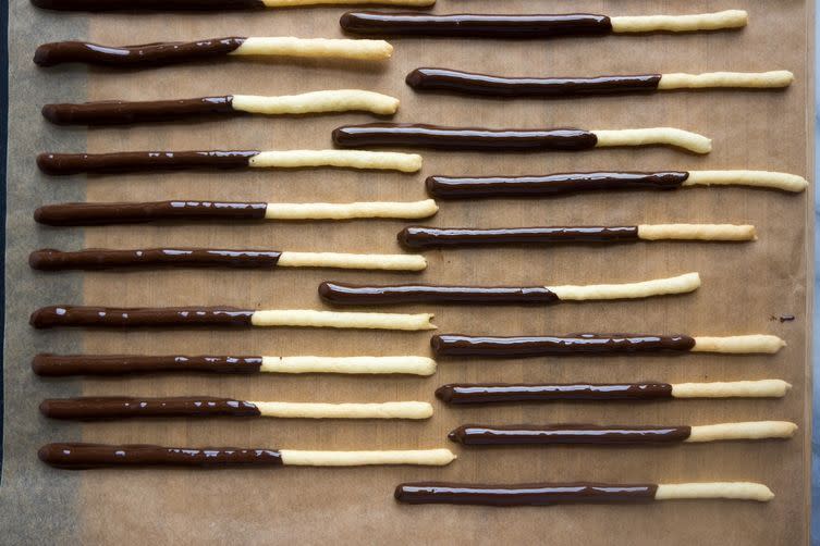 <p>This classic Japanese snack is perfect for movie munching. Try<b> <b><b><a href="https://www.food52.com/blog/11133-how-to-make-pocky-sticks-at-home?utm_source=yahoofood&utm_medium=referral&utm_campaign=9newyearsevesnacks" rel="nofollow noopener" target="_blank" data-ylk="slk:Homemade Pocky Sticks;elm:context_link;itc:0;sec:content-canvas" class="link ">Homemade Pocky Sticks</a>. </b></b></b><i>(Photo: Samantha Seneviratne/Food52)</i></p>