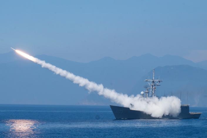 A Cheng Kung class frigate fires an anti air missile as part of a navy demonstration in Taiwan's annual Han Kuang exercises off the island's eastern coast near the city of Yilan, Taiwan on Tuesday, July 26, 2022.
