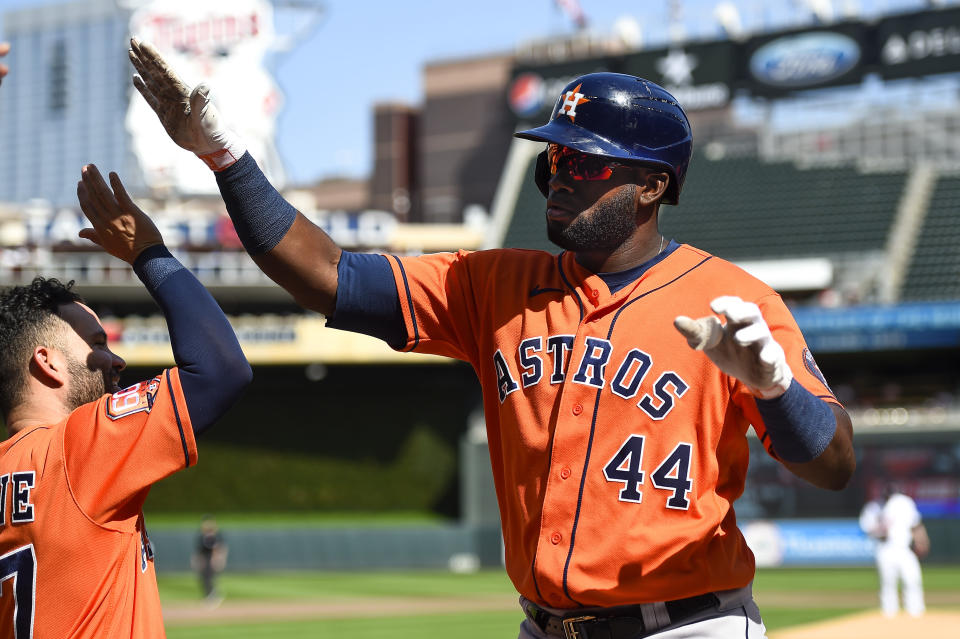 Houston Astros left fielder Yordan Alvarez celebrates after hitting a two-run home run against Minnesota Twins pitcher Josh Winder during the first third of a baseball game, Thursday, May 12, 2022, in Minneapolis. (AP Photo/Craig Lassig)
