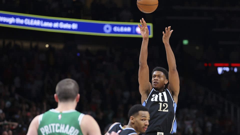 Hunter shoots the three with 11 seconds left on the clock. - Kevin C. Cox/Getty Images