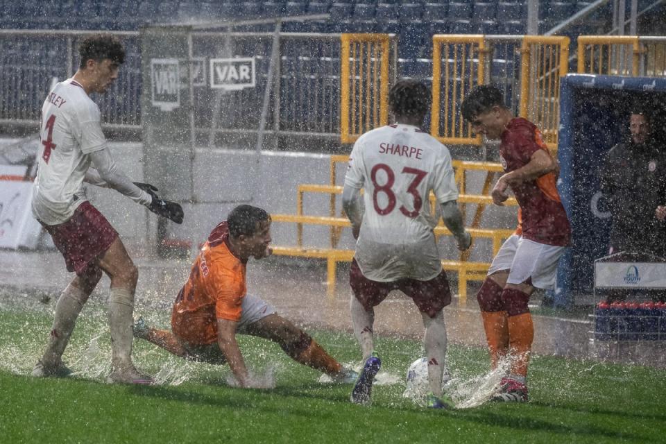 The Uefa Youth League match between the clubs was hit by heavy rain  (Getty Images)