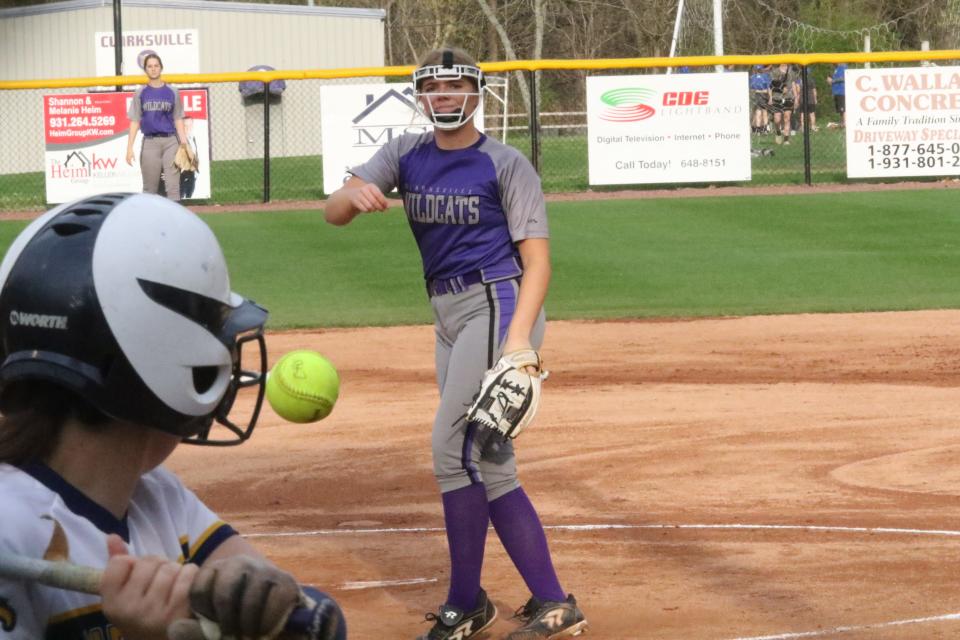 A Northeast batter watches an inside pitch hurdle toward home plate against Clarksville pitcher Emberly Nichols during their District 13-4A softball game Tuesday, April 12, 2022 at Clarksville High School.