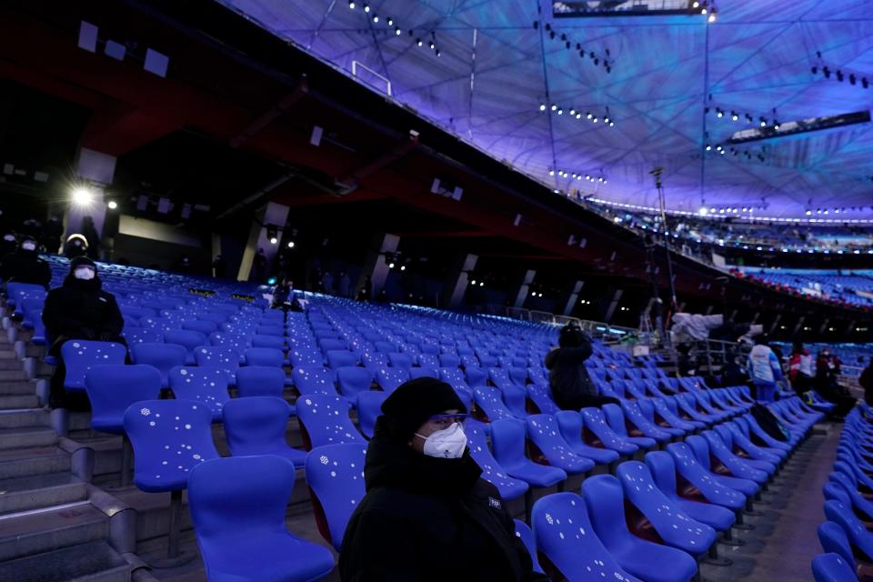 The seats for the opening ceremony of the 2022 Winter Olympics are mostly empty due to the COVID-19 pandemic.