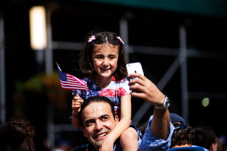 Selfies along the parade route.&nbsp; (Photo: Demetrius Freeman for HuffPost)