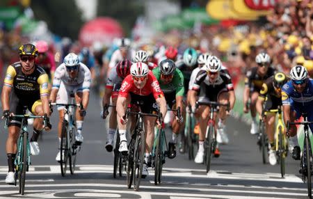 Cycling - Tour de France - The 181-km Stage 8 from Dreux to Amiens Metropole - July 14, 2018 - LottoNL-Jumbo rider Dylan Groenewegen of the Netherlands wins the stage ahead of Lotto Soudal rider Andre Greipel of Germany and Quick-Step Floors rider Fernando Gaviria of Colombia. REUTERS/Benoit Tessier